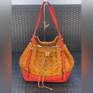 Authentic Vintage MCM Cognac Visetos Coated Canvas bucket Tote Red orange trim.